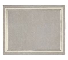 a gray rug with white border