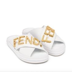 Oversized Logo Lettering Gleams Atop The Crisscross Straps Of This Sporty Platform Slide Made Of Supple Calfskin Leather With A Comfortable Contoured Footbed. Approx. 1" (25mm) Platform Leather Upper And Lining/Synthetic Sole Made In Italy ***Please Know Your Size In This Brand. Designer Shoes Tend To Run Small.*** Color: White And Gold Size 37 2 Dust Bags Included $1150 Chic Logo Sandals For Summer, Chic Summer Sandals With Logo, Designer White Sandals For Spring, Fendi Slides, Fendi Sandals, Fur Sandals, Ankle Strap Sandals Flat, Strappy Platform Sandals, Logo Letter