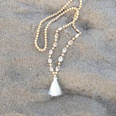 Can Be Worn In Multiple Ways Puka Seashells Long Necklace With Tassel Soft Wooden Beads New Comes In Plastic Packaging Message Me If You Have Any Questions Bohemian Pearl Strand Beaded Necklace, Pearl Strand Beaded Necklaces For Beach, Beach Pearl Beaded Jewelry, Spiritual Beach Jewelry With Faceted Beads, Spiritual Faceted Beads Jewelry For Beach, Spiritual Beach Faceted Bead Jewelry, Summer Beach Tassel Necklaces, Bohemian Beaded Tassel Necklace For Beach, Handmade Spiritual Tassel Necklace For Beach