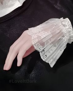 Lace Thin Pleated Flare Sleeve False Cuffs. These exquisite lace wrist cuffs, perfect for dresses, sweaters, and casual wear, add a touch of elegance and romance to your look. Crafted with attention to detail, the ruffled lace cuff design and flared sleeves create a Gothic bracelet that complements your unique fashion sense. Cuff Circumference: 21cm Features: Stretchable and lightweight lace wrist cuff for comfort. Versatile accessory for enhancing dresses, sweaters, and T-shirts. Gothic-inspire Lace Sleeves Design, Lace Wrist Cuffs, Wrist Gloves, Gothic Bracelet, Cuff Design, Formal Gloves, Fake Collar, Lace Bracelet, Lace Cuffs