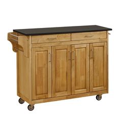 a kitchen island with black top on wheels