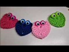 three crocheted eyes are on top of each other