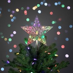 a lighted christmas tree topper in the shape of a star with multicolored lights