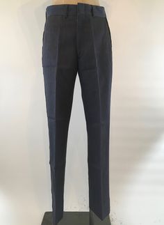 "Fabulous military dress pants/ marching band trousers made of (not sure...guessing) a heavy cotton/nylon twill with cotton banding around and inside the waistline. The black stripes down each leg are made from a heavy corduroy. Metal zipper fly with a flat hook and eye as well as a white glass button keep these trousers shut. Pants are heavy duty and were meant to last. Flat front pants have a watch pocket in the front ant two flat pockets in the back. Waist 38\" Rise 11.5\" Leg Length 30.5\" V Fitted Full-length Cotton Dress Pants, Fitted Flat Front Cotton Dress Pants, Fitted Cotton Flat Front Dress Pants, Tailored Cotton Bottoms, Formal Fitted Cotton Bottoms, Fitted Full-length Chinos With Pockets, Fitted Cotton Pants For Semi-formal Occasions, Semi-formal Cotton Fitted Pants, Fitted Military Cotton Bottoms