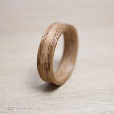 a wooden ring sitting on top of a table