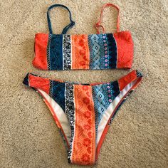 Nwot Bright Multi-Color Bikini With Strap Adjustable Top & Cheeky Bottoms Size X-Small Nwot, Never Worn. In Excellent Condition. Beautiful Bright Orange, Blue, Green Pink & White Colors Adjustable Straps On Top. Removable Padding From Bra/Top. Smoke Free, Pet Free, Very Clean Home Bohemian Orange Swimwear For Pool, Trendy Orange Beach Party Swimwear, Orange Festival Swimwear, Orange Bohemian Swimwear, Bohemian Orange Festival Swimwear, Bohemian Orange Swimwear For Beach Party, Summer Festival Orange Swimwear, Orange Summer Festival Swimwear, Bright Orange