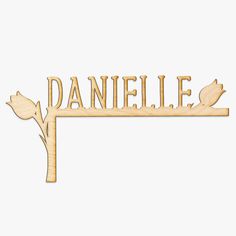 a wooden sign that says danielle with two birds on it and the word danielle written in wood