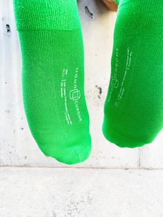 You want green socks...we've got your green socks! Just basic, plain, awesome, normal human-style amazing green socks. No hilarious pictures. No ironic sayings. No clever patterns. No loud logos. We do have our logo on the bottom so that if you're kickin' back at home and someone happens by your lounging feet tucked in these yummy green socks, they can see how to get their own pair. Get a pair! Green Socks, Socks, Funny Pictures, Human, Green, Pattern