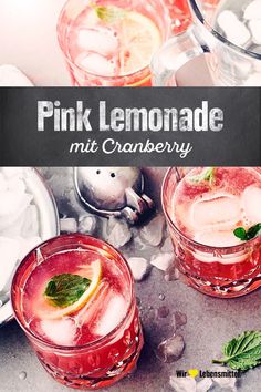 two pink lemonade cocktails with mint garnish and ice