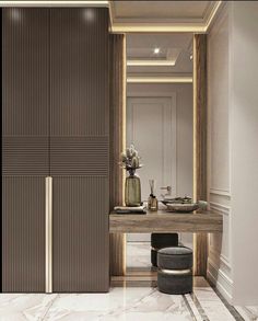 a bathroom with a mirror, sink and stool in the corner next to a door