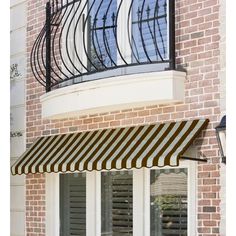 an awning on the outside of a brick building