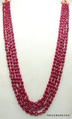 "Product Detail are as follows:- Stone Name:---------------------> Natural African Mozambique Ruby. Type:-------------------------------> Natural Genuine Ruby Stone Product Type:--------------------> Smooth Oval Beads. Shape:------------------------------> Oval shape. Size:----------------------------------> 4x4x2MM to 10x7x4MM Approx. Quantity:---------------------------> 1 Strand. Length:------------------------------> 18\" inch to 21\" inch Approx Weight:----------------- Oval Traditional Beads For Jewelry Making, Traditional Oval Handmade Beads, Traditional Oval Faceted Beads And Cabochons, Polished Oval Beads Gems And Cabochons For Gift, Oval Polished Beads For Gifts, Oval Beaded Necklace With Large Beads For Gifts, Oval Beaded Necklace With Large Beads As Gift, Large Oval Beads For Jewelry Making, Traditional Faceted Oval Beads