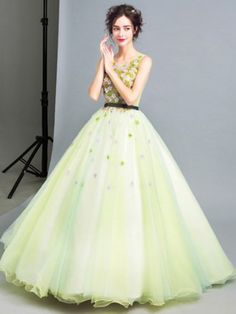 Green Ball-gown Scoop Neck Floor-length Tulle Wedding Dress With Flowers Spring Wedding Green Ball Gown, Spring Green Ball Gown, Green Ball Gown Wedding Dress With Sweep Train, Green Ball Gown For Wedding And Prom Season, Green Ball Gown For Wedding During Prom Season, Green Tulle Ball Gown For Debutante Ball, Green Ball Gown With Sweep Train For Wedding, Green Floor-length Wedding Dress For Debutante Ball, Green Wedding Ball Gown With Sweep Train