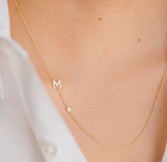 Beautifully handcrafted 14k solid gold asymmetrical initial and a small bezel diamond on a dainty cable link chain necklace, available in 14k yellow gold, white gold, and rose gold, this stunning piece will be you new favorite necklace. Wear it with your initial, or your loved one's. Made in L.A. Initial Size: Approx. 6mm Diamond Carat Weight: 0.03 (ct. tw) Diamond Clarity: VS Total Weight: Approx. 2 grams Ships in 4-8 business days All personalized items are Final Sale   Note: Each initial is thoughtfully connected to reduce the chance of flipping, however, due to the nature of the necklace some flipping can be expected. Comes gift ready in a beautiful custom Zoe Lev jewelry box Sideways Initial Necklace, Diamond Initial Necklace, Gold Letter Necklace, Diamond Solitaire Necklace, Gold Letter, Solitaire Necklaces, Letter M, Classy Jewelry, Initial Jewelry