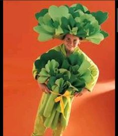 a person in a costume made to look like broccoli