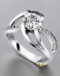 a white gold ring with diamonds on it