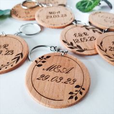 wooden keychains with names and date engraved on them