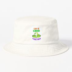 the children's hat is white and has different animals on it