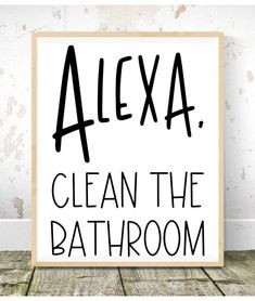 a sign that says, alexa clean the bathroom on it in black and white