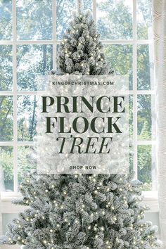 a christmas tree in front of a window with the words prince flock tree shop now