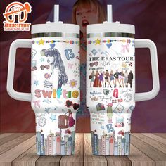 two white travel mugs with the faces of taylor and swiftie on them