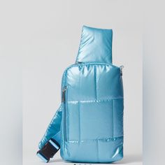 a blue bag with a cell phone in it's back pocket and strap around the neck