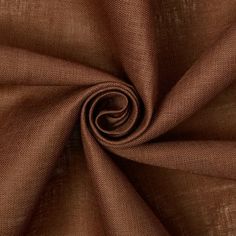 a close up shot of brown fabric