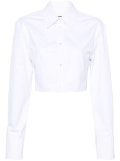 white cotton poplin texture mini logo tag classic collar front button fastening long sleeves buttoned cuffs boned bodice fitted waistline cropped Luxury Designer White Shirt, Luxury White Tops, Crop Top Dress Shirt, White Cotton Cropped Shirt With Button Closure, Chic Fitted Cropped Shirt With Collar, White Fitted Cropped Shirt Chic Style, Chic Fitted White Cropped Shirt, Chic White Fitted Cropped Shirt, Fitted Collared Cotton Crop Top