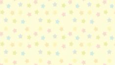 a yellow background with multicolored stars