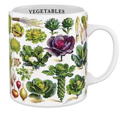 a coffee mug with vegetables on it and the words vegetablees written in large letters