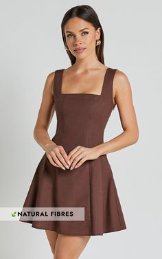 Get ready to turn heads in the Adiana Mini Dress! This linen look square neck dress in chocolate is perfect for those casual days out or fun festival adventures. The shirred back and A-line silhouette create a flattering fit, while the sleeveless design keeps you cool and comfortable all day long. Made from a blend of linen and cotton, this dress not only looks amazing but feels great too. With its versatile style and earthy brown color, it's easy to see why the Adiana Mini Dress is a must-have addition to your wardrobe. Product Details: Zips detail Shift, Day Dress Linen, Cotton fabric Square neckline Casual, Festival wear Mini length Sleeveless design Size and Fit Size S / 8 length: 80cm / 31.5in Material and Care 70% Cotton, 30% Linen No Stretch Natural Fibres The main fabric of this pr Brown Fitted Square Neck Dress, Fitted Brown Mini Dress With Square Neck, Brown Fitted Mini Dress With Square Neck, Spring Mini Dress With Square Neck In Brown, Brown Square Neck Mini Dress For Spring, Spring Brown Mini Dress With Square Neck, Casual Festival, Earthy Brown, Square Neck Dress