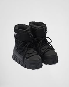 Black Re-Nylon gabardine après-ski boots | PRADA Apres Ski Boots, Y2k Boots, Prada Nylon, Triangle Logo, Ski Boots, Swag Shoes