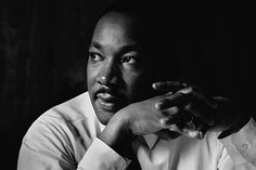 martin luther king is shown in this black and white photo with the caption's name