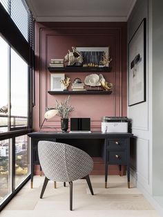 a home office with pink walls and black desk in front of a window overlooking the city