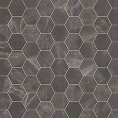 an image of a tile pattern that looks like hexagonals in grey and white