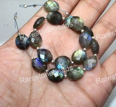 "Description size: -  10x12  Millimeters approx. Material - Gemstone  Gemstone - Natural Labradorite  shape- Oval  Quantity - 10  Pieces Lot -------------------------------------------------------------------------------------- \"WE ARE MANUFACTURERS AND WHOLESALER'' All items were manufactured at our factory by our skilled workers that let us to keep our prices down So We can sell gemstones Beads and jewelry in REASONABLE PRICES . --------------------------------------------------------------------------------------- We take the pictures under professional studio lights and enlarge the items. The goal is to show the natural beauty of gemstones. Depending on your PC monitor screen, the colors of the stones may be slightly different than the pictures. --------------------------------------- Fancy Stones, Rare Stone, Rose Quartz Beads, Rose Quartz Stone, Amethyst Beads, Unique Gemstones, How To Make Earrings, Amethyst Gemstone, Quartz Stone