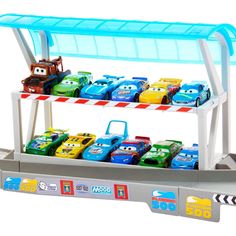 toy cars are lined up in the shape of a car wash station for children to play with