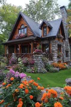 a house with flowers in the front yard