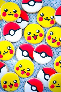 some very cute looking cookies with different designs on them's faces, and eyes