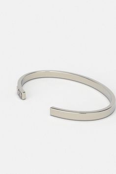 Whether you're looking for a traditional look or something newer, this cuff for men is a timeless piece of jewelry that you can wear for official events and everyday life.When choosing a men's jewel, ensure the style and material match your outfit. Choosing a comfortable men's bracelet is essential in ensuring it fits perfectly.Their exteriors and minimal shape allow the precious metal plating to shine through. You can wear them alone or with other minimal accessories with similar tones. This is the perfect piece to accessorize your wardrobe. Metal: 925 Sterling Silver / 24k Gold Plated / Rhodium over 925 Sterling Silver Dimensions: 6 mm W One Size Fits Most The cuff can open and close, is a malleable metal and carefully can adjust to your wrist. Type: Cuff 100% Handcrafted Package: High q Timeless Stainless Steel Bracelets For Anniversary, Timeless Stainless Steel Bracelets For Formal Occasions, Timeless Stainless Steel Bracelet For Formal Occasions, Timeless Stainless Steel Formal Bracelet, Timeless White Gold Cuff Bracelet, Classic Formal Stainless Steel Cuff Bracelet, Classic Adjustable Cuff Sterling Silver Bracelet, Classic Adjustable Sterling Silver Cuff Bracelet, Adjustable Classic Sterling Silver Cuff Bracelet