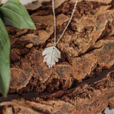 Handmade Fine Silver Hawthorn leaf Pendant on a delicate sterling silver trace chain.  This shiny Silver Leaf Necklace is made by hand from a real Hawthorn leaf. The detail of the leaf is really quite something & it shimmers in the light as it moves. This would make the perfect gift for a nature lover & is eco friendly too as Fine Silver is a recycled material. Pendant length 2.5cm & is supplied on a sterling silver trace chain, please choose which length at check out. All my items arrived beaut Hawthorn Leaf, Leaf Jewellery, Recyclable Materials, Botanical Jewelry, Leaf Jewelry, Luxury Gift Box, Leaf Necklace, Leaf Pendant, Gifts For Nature Lovers