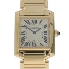 Indulge in the timeless elegance of the Cartier Tank W50003N2, a horological masterpiece that exudes sophistication and luxury. Crafted from exquisite 18K yellow gold, this iconic timepiece pays homage to the original Tank watch designed by Louis Cartier himself in 1917. The Tank's distinctive rectangular case was inspired by the shape of military tanks used during World War I, symbolising strength and modernity. Equipped with a precise quartz movement and protected by a scratch-resistant sapphi Cartier Tank Francaise, Tank Watch, Cartier Tank, Wrist Game, Tanks Military, Rolex Gmt, Breitling Navitimer, Patek Philippe Nautilus, Rolex Day Date