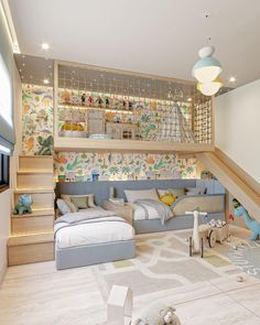 a child's bedroom with stairs leading up to the second floor