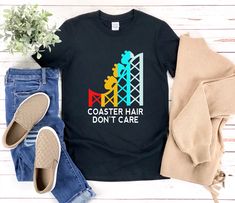 "* All shirts are unisex. * Product measurements may vary by up to 2 inches. * All Designs are originally made by myself or my team.  Roller Coaster shirt with the quote \"Coaster Hair Dont Care\" is a fun gift for men and women!  To see more designs of your topic Roller Coaster you can search & find them in my store:   https://www.etsy.com/shop/Retailorie  You find there also an announcement if the shipping & production times change :) coaster hair,roller coaster quote,roller coaster shirt,rollercoaster shirt,amusement park shirt,theme park shirt,rollercoaster gift,roller coaster ride,roller coaster tshirt,theme park birthday,carnival shirt,funny roller coaster,retro style shirt," Roller Coaster Quotes, Rollercoaster Funny, Park Birthday, Roller Coaster Ride, Parc D'attraction, Hair Rollers, Best Gifts For Men, Retro Stil, Amusement Park