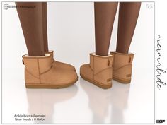 a pair of women's brown boots with bows on the bottom and one woman's legs