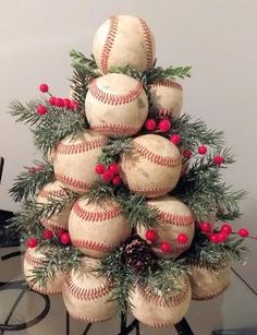 a christmas tree made out of baseballs and pine cones