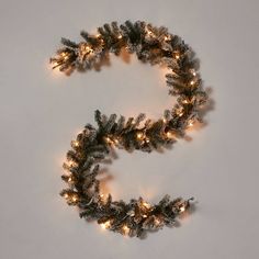 the letter s is made up of christmas lights