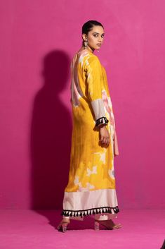 Embrace the allure of this yellow abstract print kurta set, meticulously handcrafted in cotton satin. The a-line asymmetrical kurta with full sleeves features hand-painted motifs on a cotton satin base, paired harmoniously with ivory palazzo pants in chanderi. The ensemble is highlighted with delicate hand embroidery, presenting a two-piece masterpiece of contemporary elegance. Personal Shopping Service, Yellow Abstract, Hand Woven Textiles, Digital Gift Card, Kurta Set, Full Sleeves, Popular Culture, Palazzo Pants, Indian Design