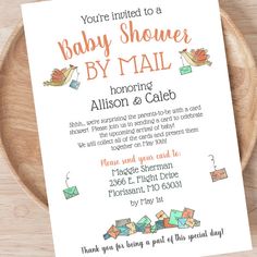 a baby shower by mail is on a plate