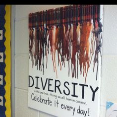 there is a sign on the wall that says diversity celebrate it every day